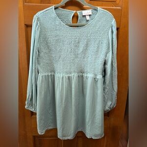 Ingrid & Isabel Smocked maternity Top in Soft teal green.